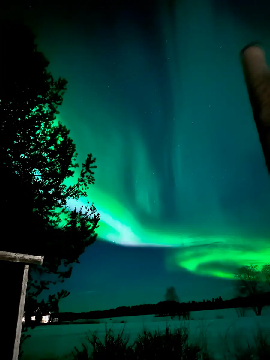 Aurora dancing across the polar sky