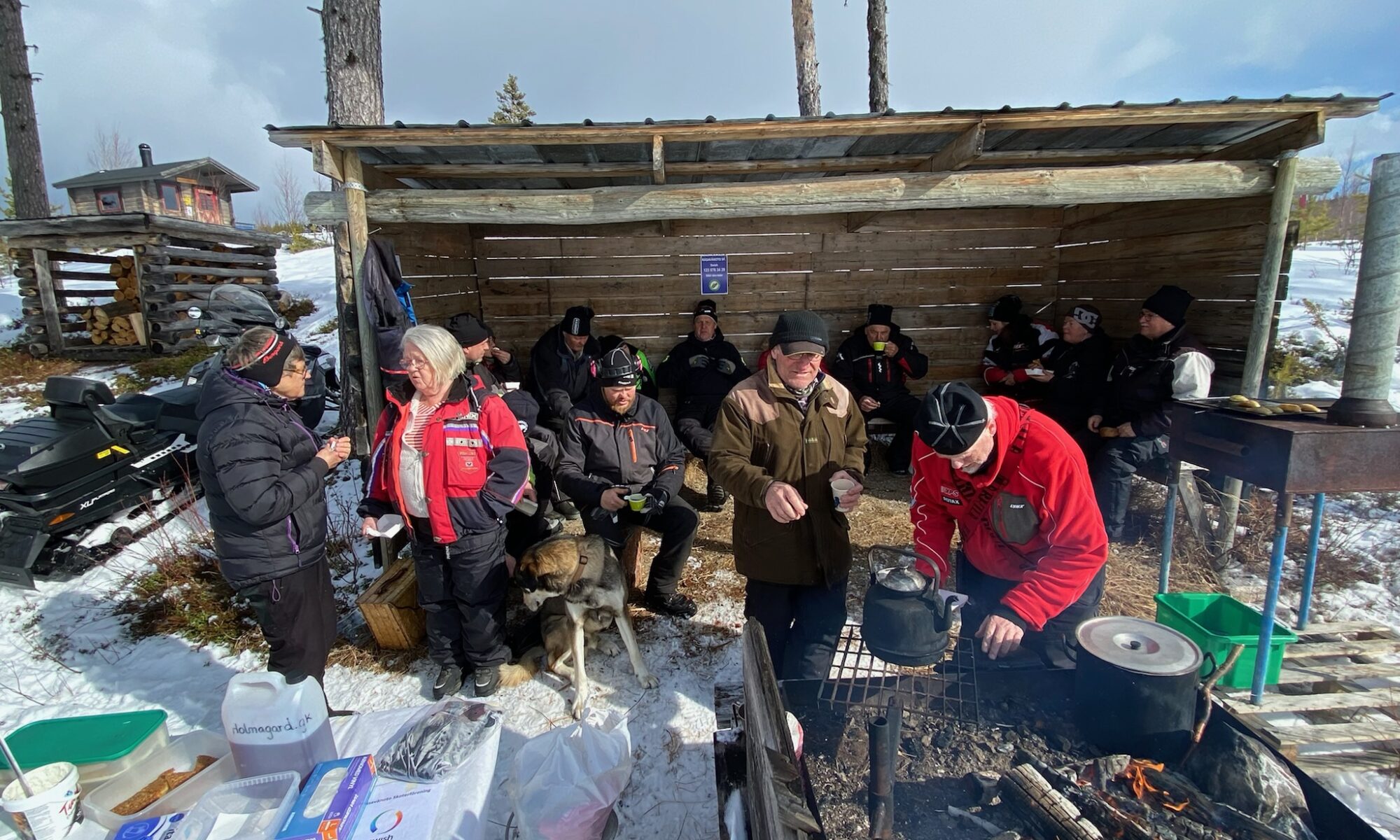 Another View of Group by Campfire in Winter